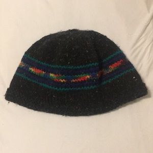 Grey winter hat with colorful embroidery